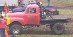 Mud Bog Racing Man Makes Fire