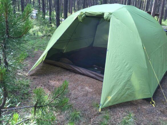 pitched daybreak 6 tent in forested campground environment
