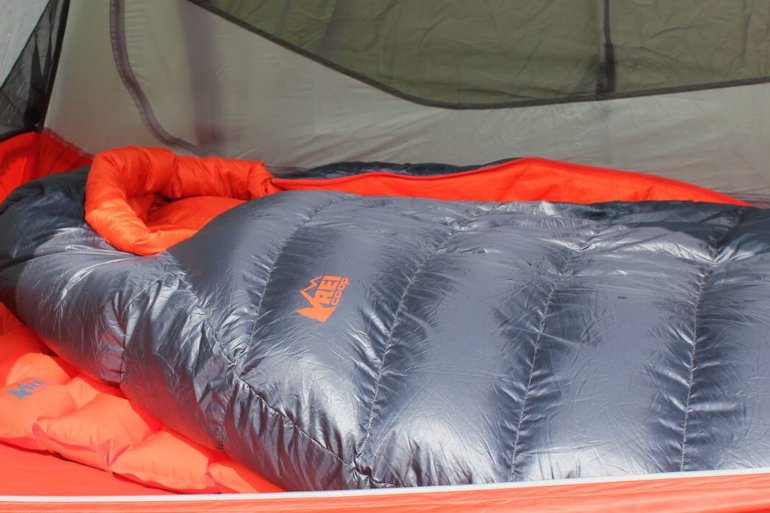 This image shows the REI Co-op Magma 10 Sleeping bag in a tent.