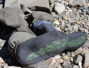 This fly fishing waders image shows a photo of the best stocking foot waders bootie design.