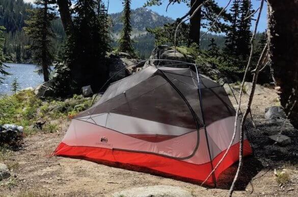 This photo shows the REI Co-op Quarter Dome 2 backpacking tent near a mountain lake.