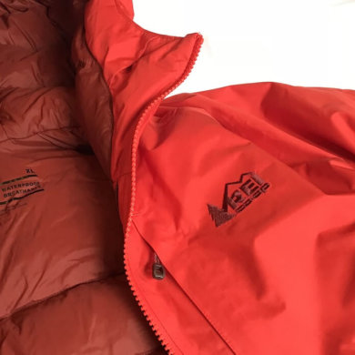 This photo shows a closeup of the REI Co-op Stormhenge 850 Down Jacket men's version.
