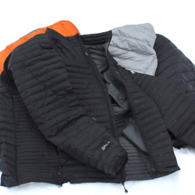 This image shows several down jackets, including an XL Tall Eddie Bauer DownLight StormDown Jacket.