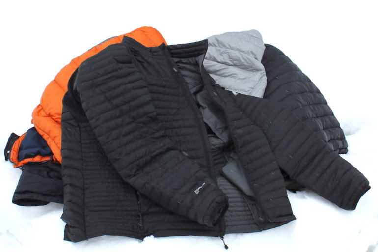 This image shows several down jackets, including an XL Tall Eddie Bauer DownLight StormDown Jacket.