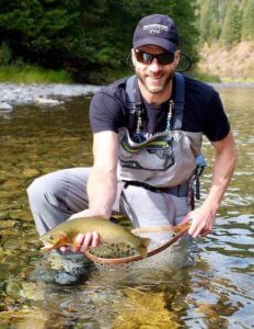 This fishing waders photo shows a fly fisherman wearing the Orvis Ultralight Waders.