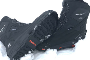 This image shows the Korkers Polar Vortex 600 winter boots in the snow.