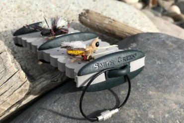 This photo shows the Smith Creek Rig Keeper fly fishing accessory on a rock.