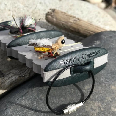 This photo shows the Smith Creek Rig Keeper fly fishing accessory on a rock.