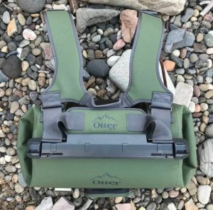 This photo of the OtterBox Trooper LT 30 soft-sided cooler shows the backpack straps and shoulder strap.
