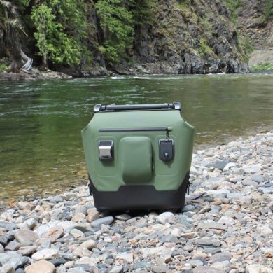 This photo shows the OtterBox Trooper LT 30 next to a river.