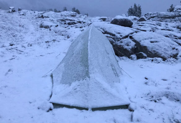 This photo shows the Big Agnes Fly Creek HV2 Platinum Tent with snow on it.