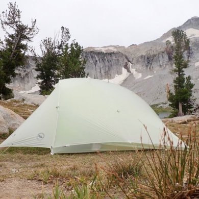 This photo shows the Big Agnes Fly Creek HV2 Platinum Tent set up near a mountain lake.
