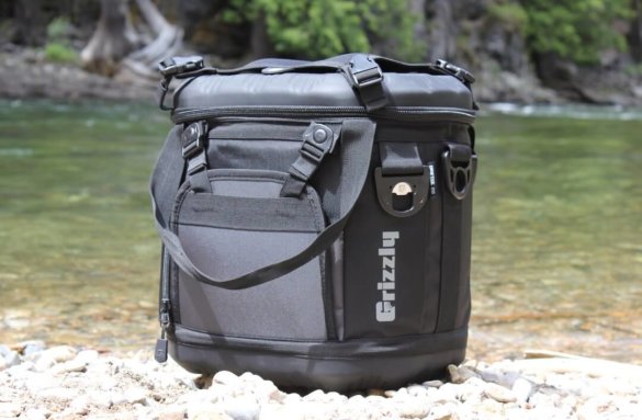 This photo shows the Grizzly Drifter 20 soft cooler near a river.