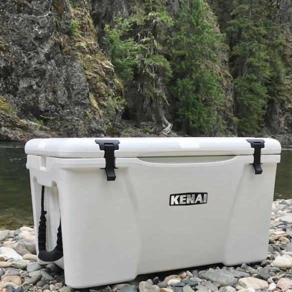 This photo shows the Grizzly Kenai 45 cooler on a river bank.