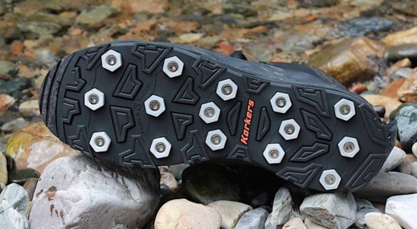 This photo shows the Korkers Triple Threat Aluminum Hex Disc Soles.