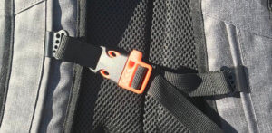 This photo shows the whistle on the sternum strap on the SEVENTY2 backpack.