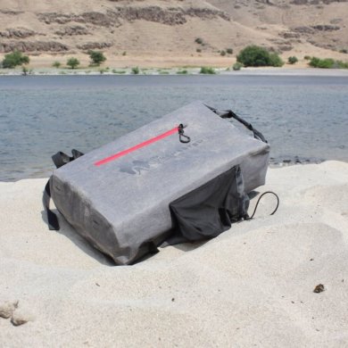 This photo shows the SEVENTY2 Survival System on a sandy beach.