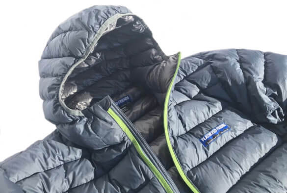 This photo shows the hood and zipper of the Feathered Friends Eos Down Jacket.