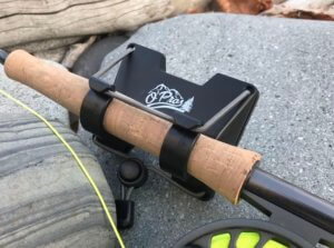 This fly fishing gift shopping guide photo shows the O'Pros 3rd Hand Rod Holder with a fly fishing rod.