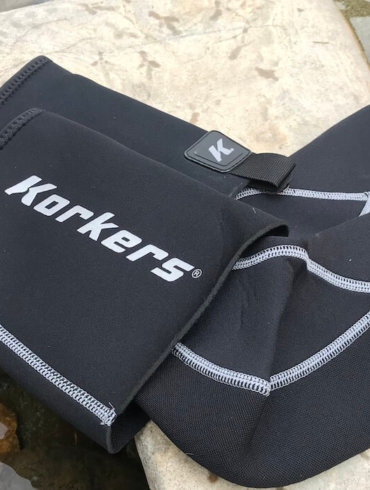 This photo shows the Korkers I-Drain Neoprene Guard Socks.