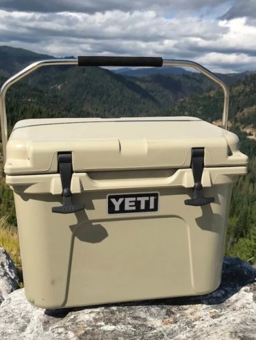 This photo shows the YETI Roadie 20 cooler outside.