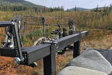 This photo shows the Last Chance Archery PACK-N-GO Portable Bow Press outside.