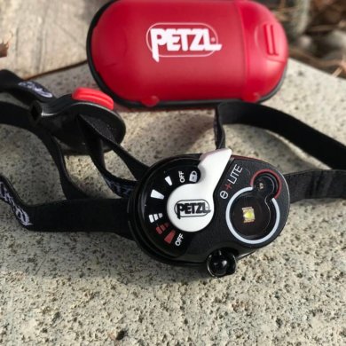 This photo shows the Petzl e+LITE Emergency Headlamp.