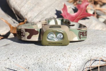 This photo shows the Petzl Tactikka + RGB Headlamp.