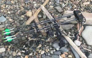 This photo shows the TightSpot Quiver attached to a compound bow.