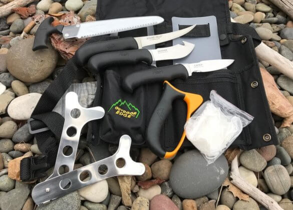 This photo shows the contents of the Outdoor Edge ButcherLite big game processing kit. 