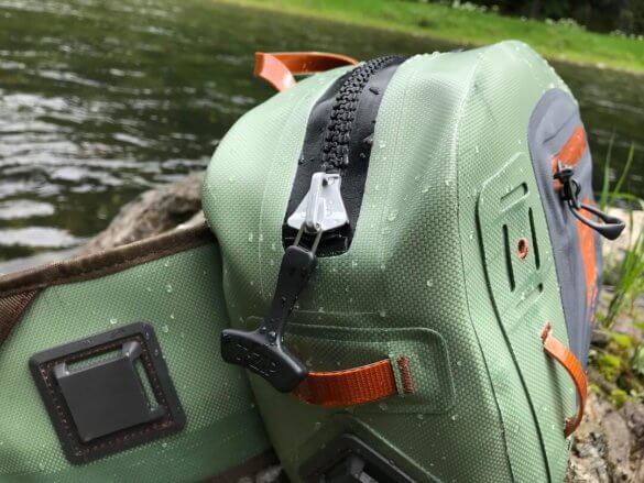 This photo shows a close-up of the TIZIP zipper on the Fishpond Thunderhead Submersible Lumbar Pack.