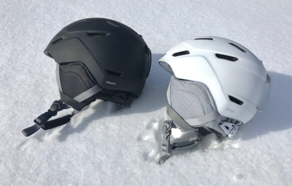 This photo shows the Smith Mission and Smith Mirage Snow Helmets outside on snow.