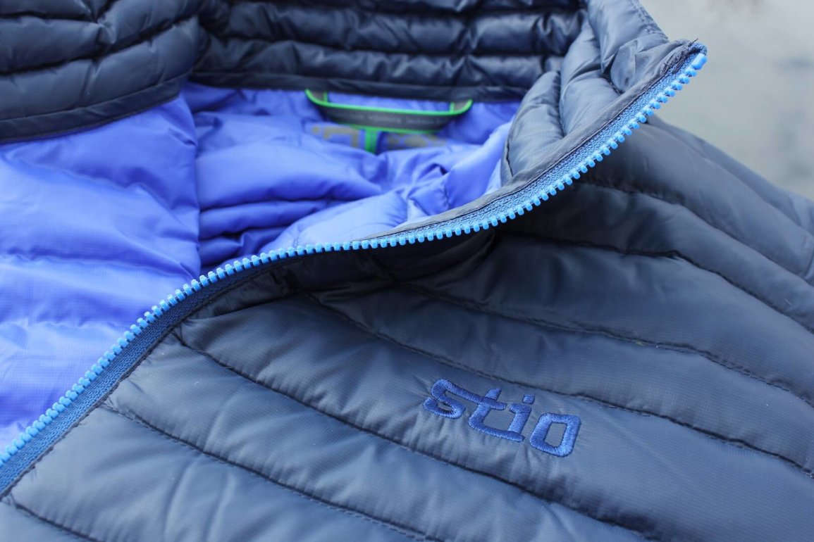 This photo shows a closeup of the collar of the Stio Pinion Down Sweater jacket.
