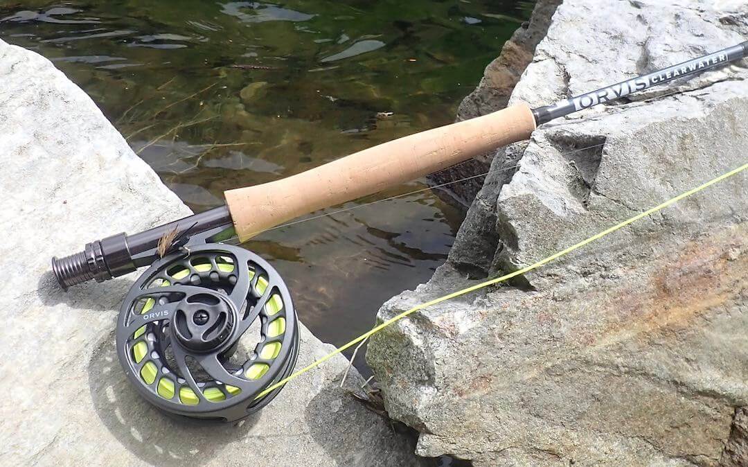 This fly fishing outfit buying guide photo shows the Redington Minnow Youth Combo rod, reel, fly line, and case outfit kit.