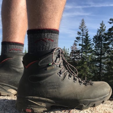 This Darn Tough sock review photo shows the Darn Tough Hiker Boot Sock Full Cushion Sock being worn by a hiker.