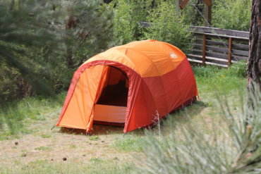 This photo shows the REI Co-op Kingdom 8 Tent setup for camping.