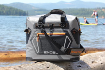 This photo shows the Engel HD30 cooler near a lake.