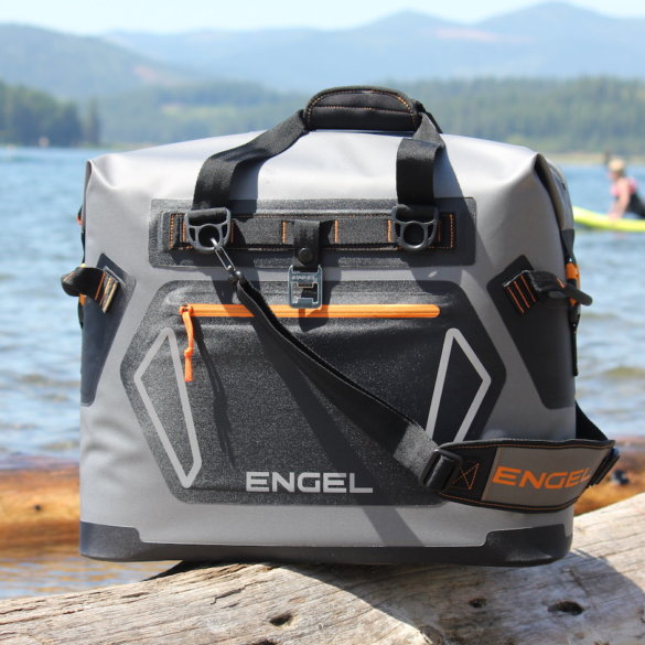 This photo shows the Engel HD30 cooler near a lake.