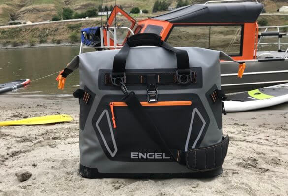 This photo shows the front of the Engel HD30 cooler on a beach.