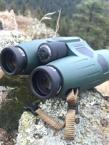 This review photo shows the Cabela's Instinct Euro HD binoculars outdoors.