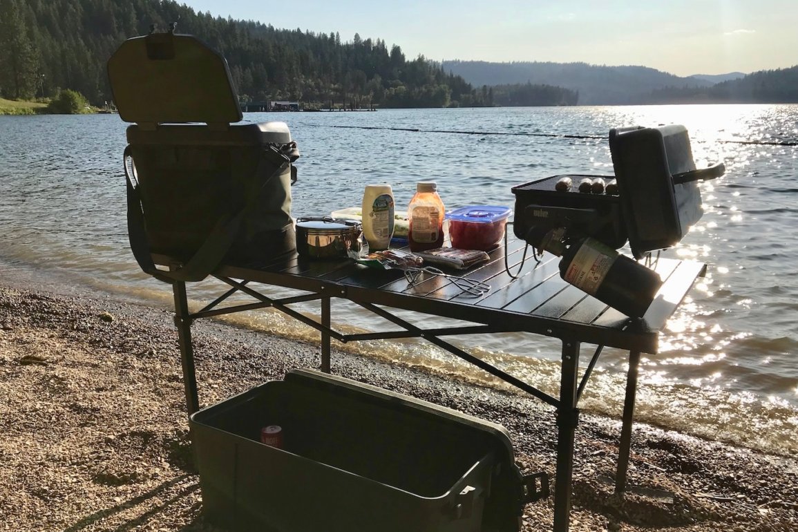 This photo shows the Mountain Summit Gear Heavy-Duty Roll-Top XL Table outside.