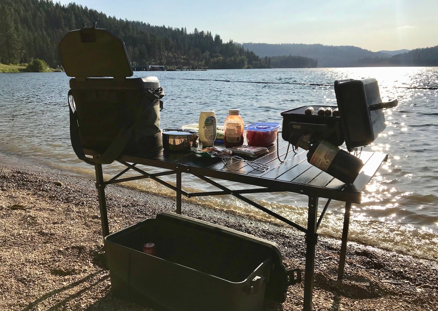 This photo shows the Mountain Summit Gear Heavy-Duty Roll-Top XL Table outside.