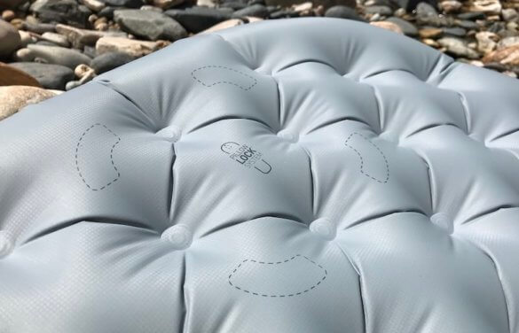 This photo shows a closeup of the Pillow Lock System placement on the Sea to Summit Ether Light XT Insulated Air Sleeping Mat.