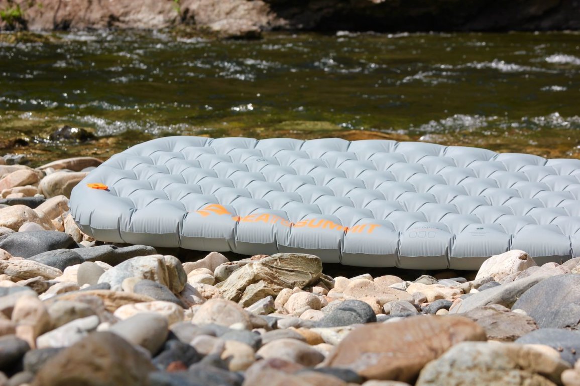 This review photo shows a fully inflated Sea to Summit Ether Light XT Insulated Air Sleeping Mat outside.