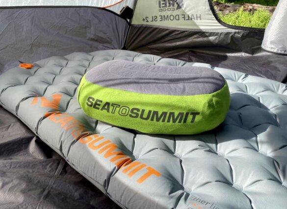 Sea to Summit Ether Light XT air mattress inside a backpacking tent with an inflatable pillow on top.