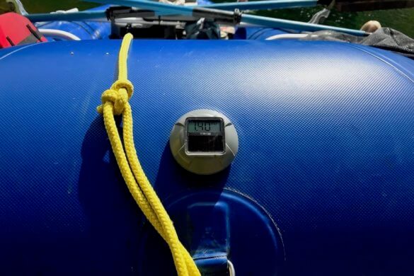 This review photo shows the TRīB airCap Pressure Gauge installed on the front of a raft.