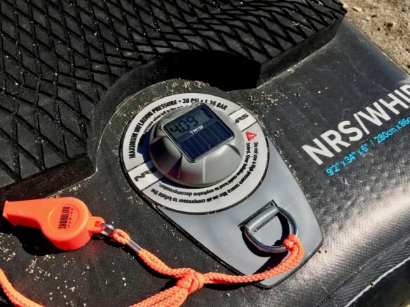 This review photo shows the TRīB airCap Pressure Gauge on a SUP.