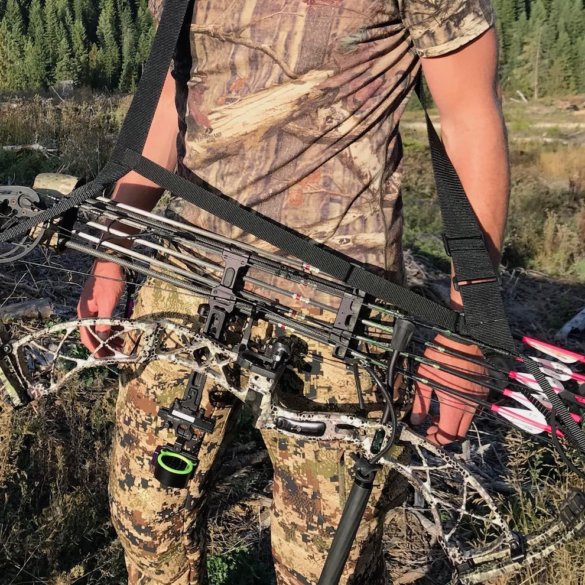 This photo shows a bowhunter wearing the Bow Buddy Bow Sling with a compound bow.
