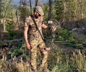This photo shows the Bow Buddy Bow Sling on a hunter using the sling in a vertical position. 