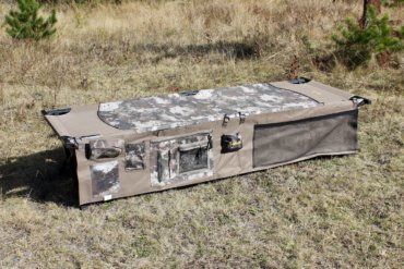 This photo shows the Cabela's O2 Octane Camp Cot with Organizer.